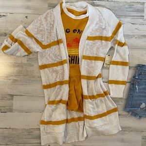 White cardi with gold stripes